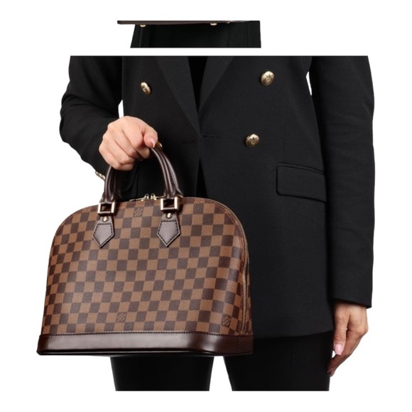 Louis Vuitton Handbags - Louis Vuitton Damier Ebene Canvas Alma PM Handbag With Top Zip Metal Hardware.